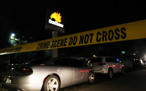 Police tape marks the scene where five people were killed at a SunTrust Bank branch on January 23, 2019 in Sebring, Florida.