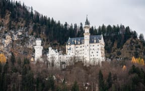 SYMBOL - 26 November 2024, Bavaria, Schwangau: Neuschwanstein Castle. Photo: Silas Stein/dpa (Photo by Silas Stein / dpa Picture-Alliance via AFP)