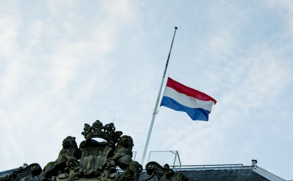 The Dutch flag flies half mast on the Defence building in The Hague.
