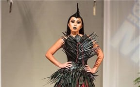 Shona Tawhiao's flaxwork outfit on the catwalk at MaMo in Honolulu, Hawaii.