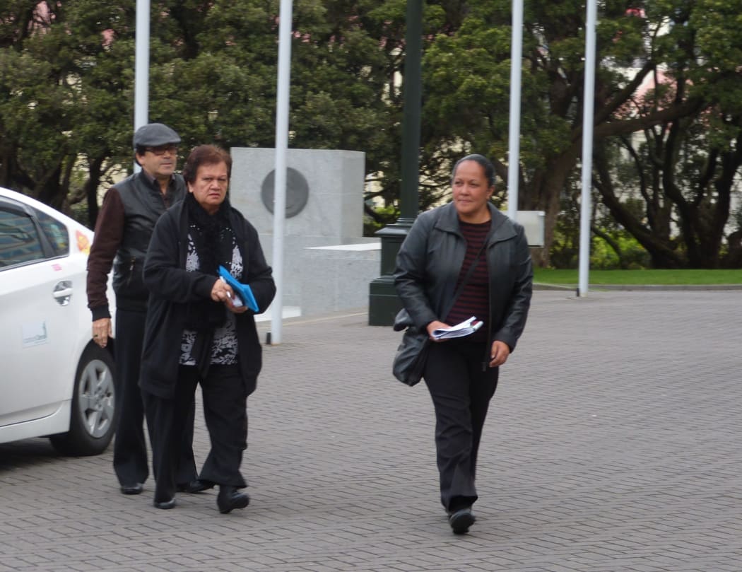 Boad members Toni Waho, left, Druis Barrett and Tina Ratana arrive at Parliament.