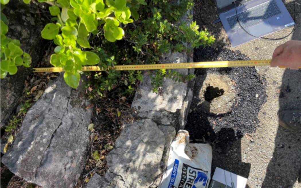 A small cavity found at the edge of the Dolomite Point Track at Punakaiki. An ecologist told the Department of Conservation they believed the hole was likely to be due to the collapse of a mouse burrow subsequently discovered below the surface.
