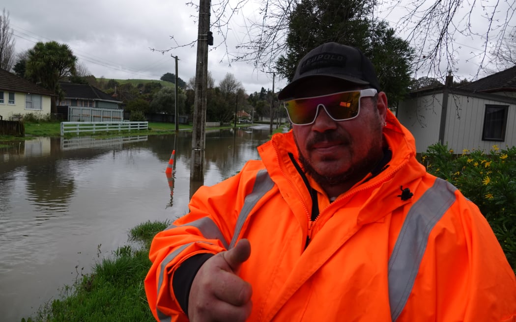 Mike Fiti of Downer has spent Sunday working on traffic controls and updating residents in Tararua District about the floodwater, on Sunday 18 August, 2024.
