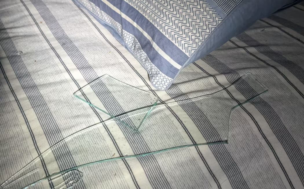 These shards of glass were lying on the bed.