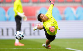 Goalkeeper Alex Paulsen of New Zealand warms up.