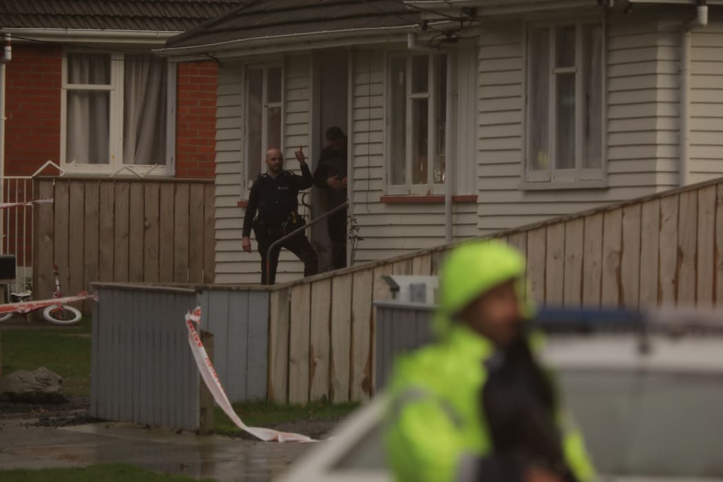 A property on George St is cordoned off by police after a shooting