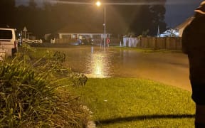 Surface flooding on Duncan Street, off Valley Road, in the Gisborne suburb of Mangapapa, 28 February 2023.