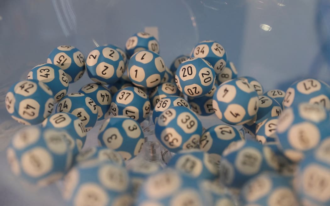 A picture taken on February 23, 2017 in Paris shows balls used for the Loto lottery game draw of Française des Jeux (FDJ), the operator of France's national lottery games, after the official presentation of its new version. (Photo by THOMAS SAMSON / AFP)