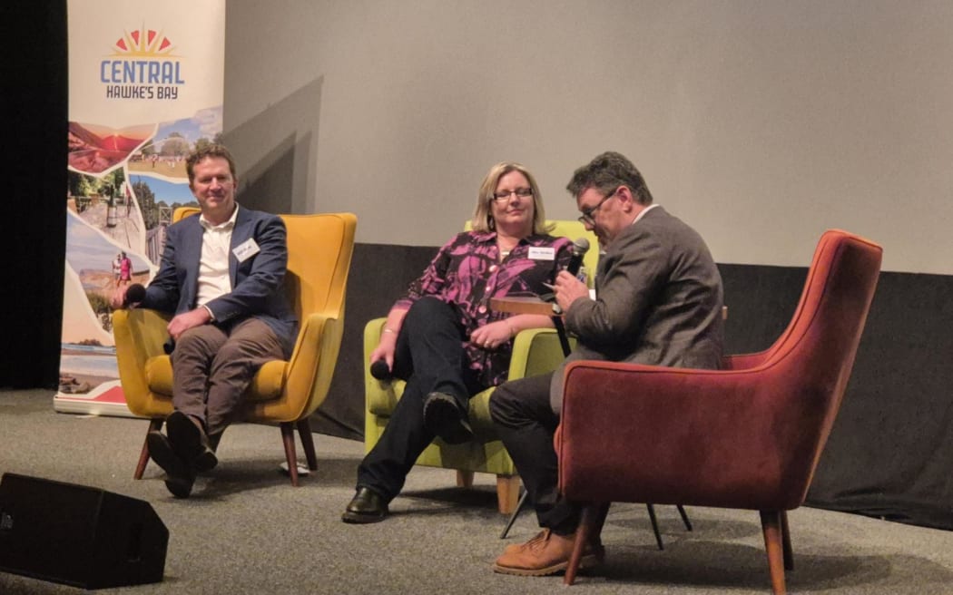 Local farmer Will Foley and Central Hawke's Bay Mayor Alex Walker on stage with moderator Jonathan Milne.
