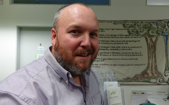 Head and shoulders of man  with a beard