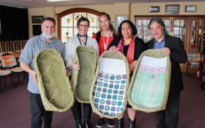 From left, Dr Ruakere Hond, Rachael Peek, Taranaki DHB associate director of Midwifery, Grace Maha, Taranaki DHB midwife and SUDI prevention coordinator, and Puhi and Philip Nuku, local weavers.