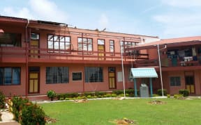 A damaged high school in Fiji's Rakiraki being used as an evacuation centre for eight families.