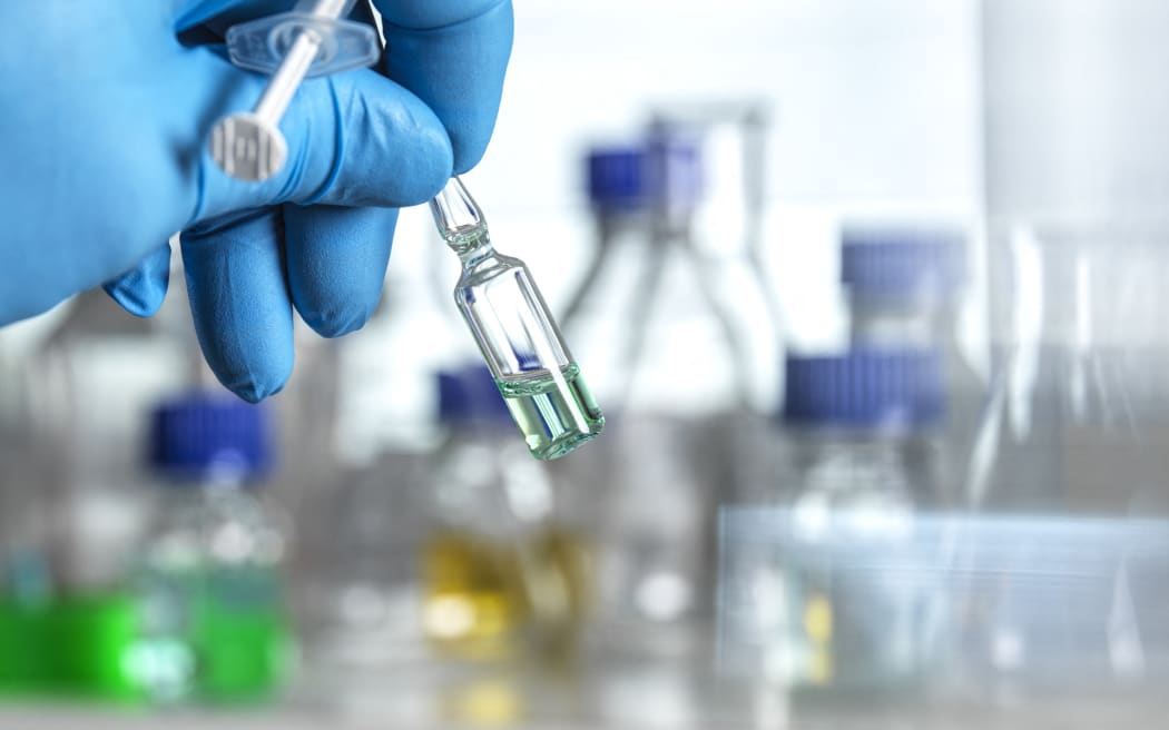 Pharmaceutical research Scientist developing a new drug or vaccine in the lab.
