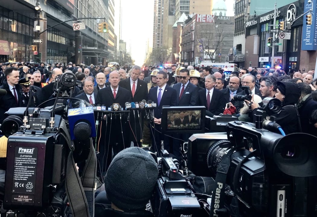 New York police department commissioner James O'Neill, New York mayor Bill de Blasio and New York governor Andrew Cuomo at a new conference near the site of the blast.
