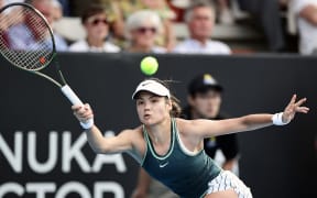 Emma Raducanu of Great Britain plays a shot in her match against Elina Svitolina of Ukraine during the 2024 Women's ASB Classic.