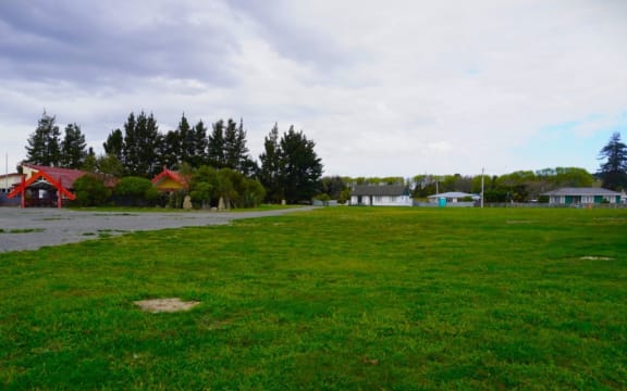 Empty field at Omahu Marae where houses will be built.