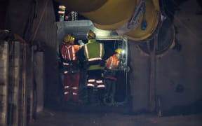 Pike River Recovery Agency engineers work to remove the 30m barrier and dewater the infrastructure at the mine site.