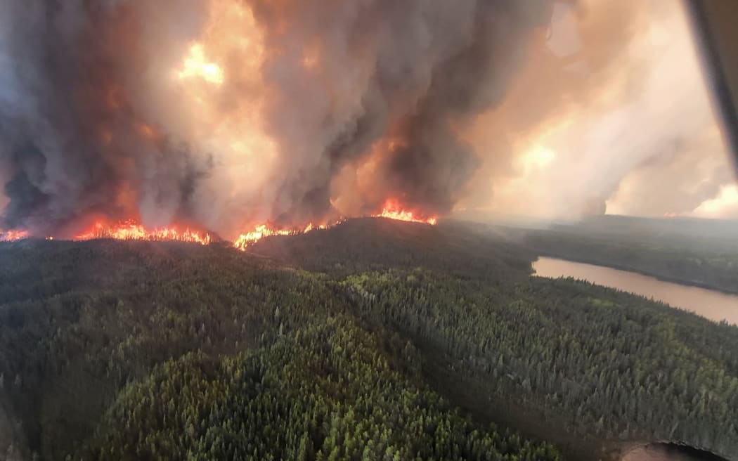 This 27 May, 2025, aerial image courtesy of the Manitoba government, shows wildfires burning in Sherridon, Manitoba, Canada.