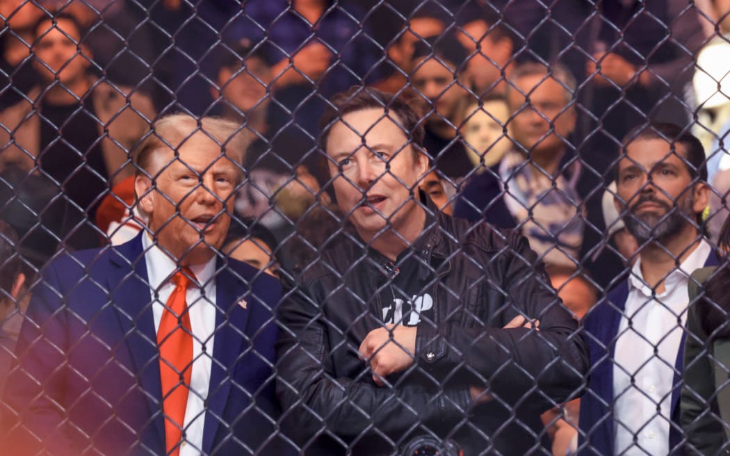 US President-elect Donald Trump, Tesla and SpaceX CEO Elon Musk and Donald Trump Jr. (R) watch a fight during UFC 309 at Madison Square Garden in New York, on November 16, 2024. - US President-elect Donald Trump was greeted by chanting fans as he attended the Ultimate Fighting Championship heavyweight bout at New York's Madison Square Garden on November 16.
Trump entered the arena shortly before the start of the main card accompanied by UFC chief executive Dana White, who was a prominent backer during his election campaign.
Several political allies of Trump were also in attendance including entrepreneurs Elon Musk and Vivek Ramaswamy, who have been asked by Trump to lead efforts to cut government inefficiency. (Photo by Kena Betancur / AFP)
