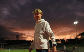 AUCKLAND, NEW ZEALAND - MARCH 19: New Zealand middle distance runner Sam Ruthe warms up before running in the mile distance at Mt Smart Stadium on March 19, 2025 in Auckland, New Zealand. Ruthe broke the four minute mile barrier with a time of 3:58.35 placing him as the youngest person in history and first under 15 years old to break the record. (Photo by Phil Walter/Getty Images)