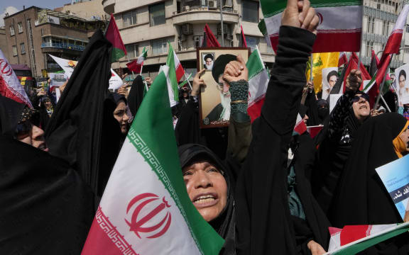 FILE - Iranian worshippers chant slogans during an anti-Israeli gathering after Friday prayers in Tehran, Iran, Friday, April 19, 2024. The apparent crash of a helicopter carrying Iranian President Ebrahim Raisi, the country's foreign minister and other top officials is likely to reverberate across the Middle East. Tensions have soared since the start of the Israel-Hamas war, and Israel and Iran directly traded fire for the first time ever in April. (AP Photo/Vahid Salemi, File)