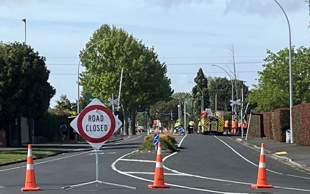The scene on Peachgrove Road in Hamilton where a train collided with a car at a level crossing. Photo / Natalie Akoorie