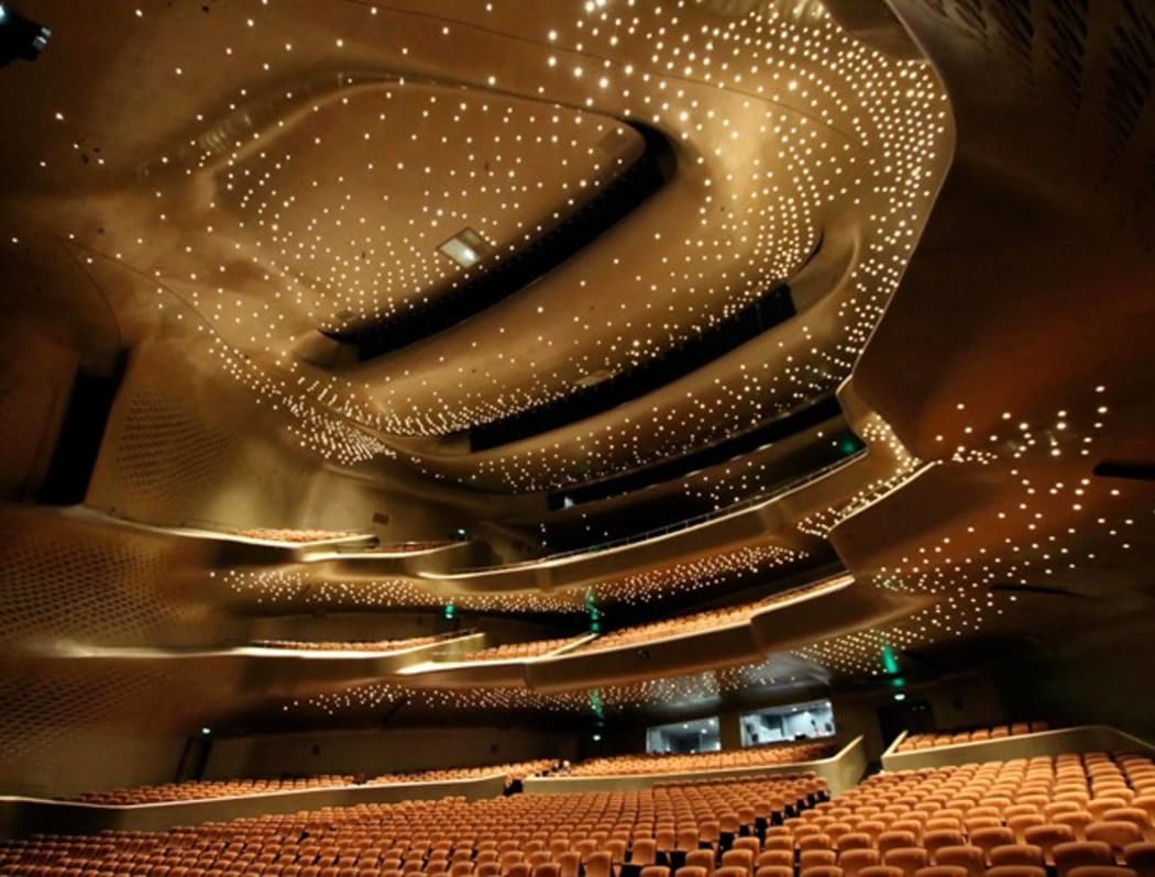 Guangzhou Opera House's asymmetrical auditorium lined with moulded panels to reflect sound devised by MarshallDay