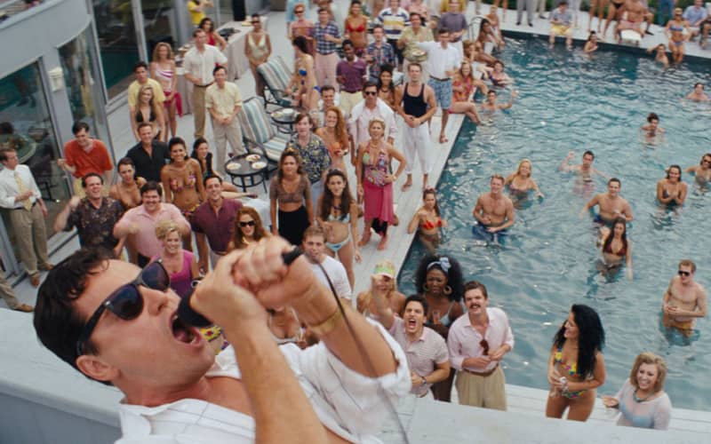 A scene from the movie Wolf of Wall Street starring Leonardo DiCaprio, which detailed the excessive celebrations and criminal activities of a financial trader l in the 1980s and 1990s.