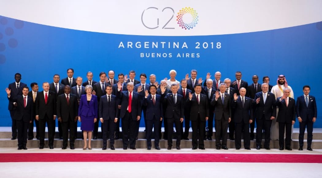 30 November 2018, Argentina, Buenos Aires: Participants of the summit took a family photo at the G20 Summit Conference Centre in Buenos Aires. The "Group of 20" unites the strongest industrial nations and emerging economies.