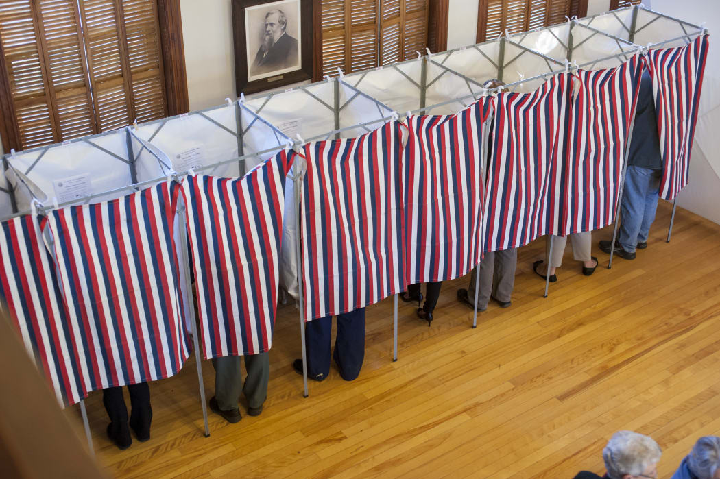 Voters cast their ballots in US election.