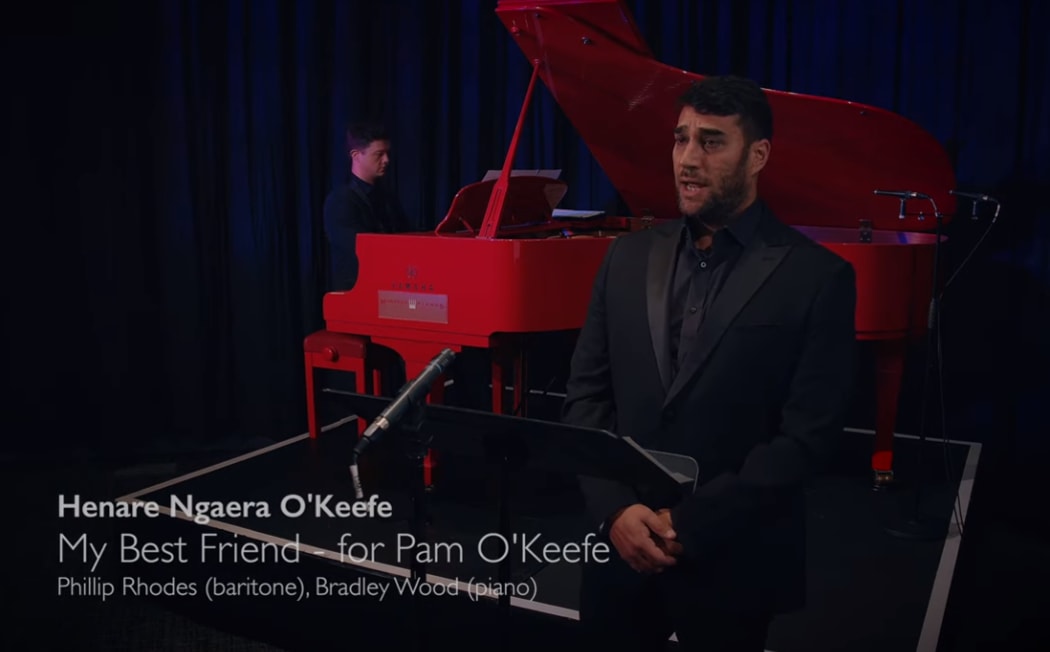 Phillip Rhodes sings to his mother Pam O'Keefe