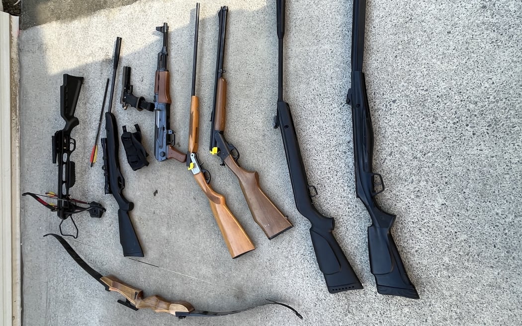 Weapons seized by police during the searches.