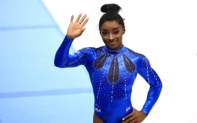 Simone Arianne Biles of United States of America waves her hand during the Women's All Around Final in Artistic Gymnastics World Championships at Antwerp Sportpaleis in Antwerp, Belgium on October 6, 2023. Biles won the event to claim the gold medal. ( The Yomiuri Shimbun ) (Photo by Takuya Matsumoto / Yomiuri / The Yomiuri Shimbun via AFP)