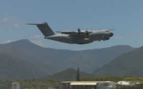 French military carrier plane Airbus A400M, based in  Orléans (France), flies  over Nouméa military air base 186.