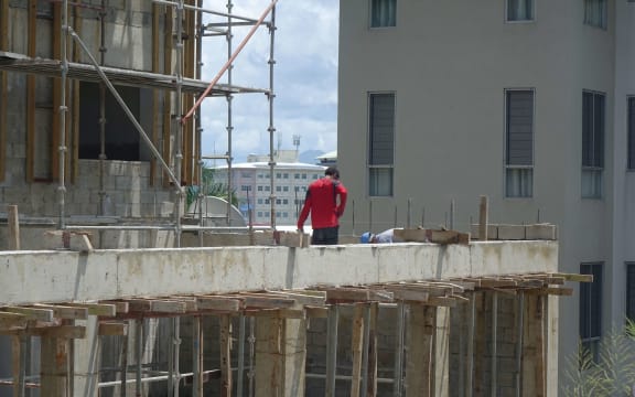 Workers on a construction site in Fiji's capital, Suva.