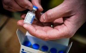 Phials of Johnson & Johnson Janssen Covid-19 vaccines pictured on 12 April 2021 at a distribution centre in the Netherlands.