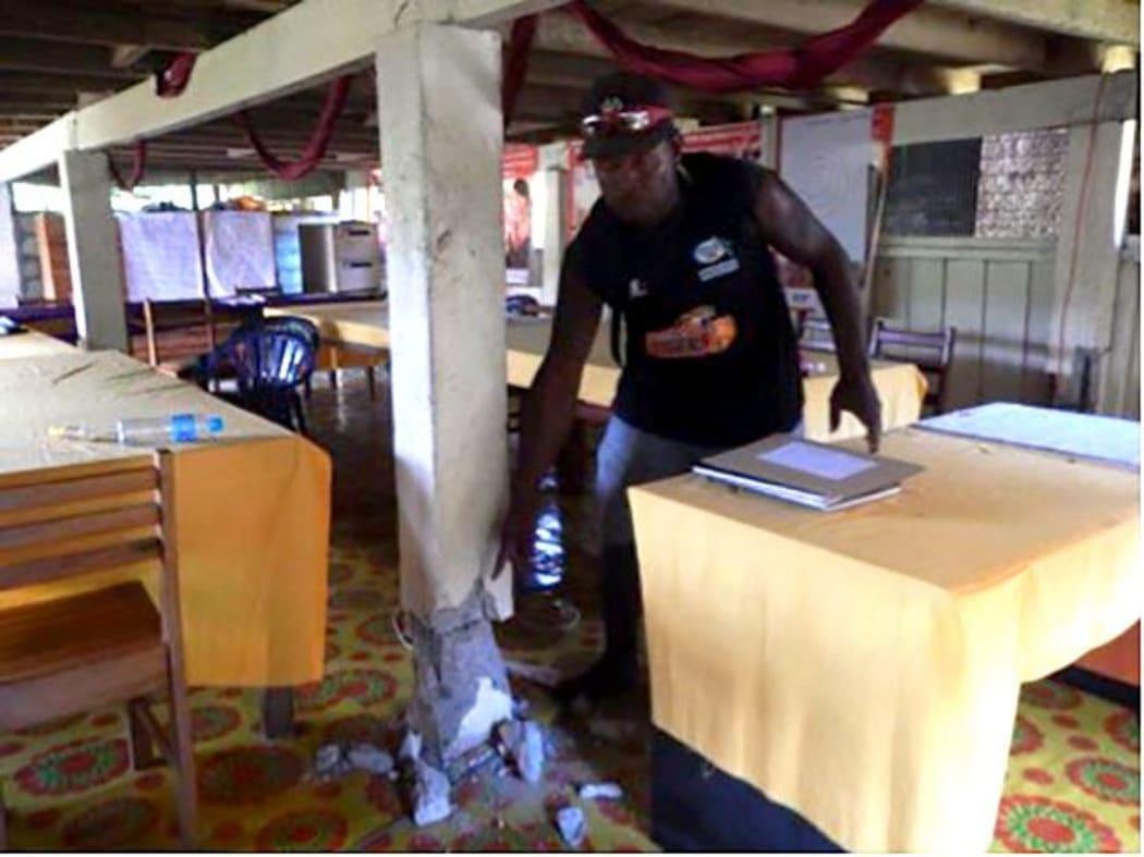 World Vision staff member George Mana shows the damage to World Vision’s office following the 7.8 magnitude earthquake which struck Solomon Islands on 9 December, 2016.