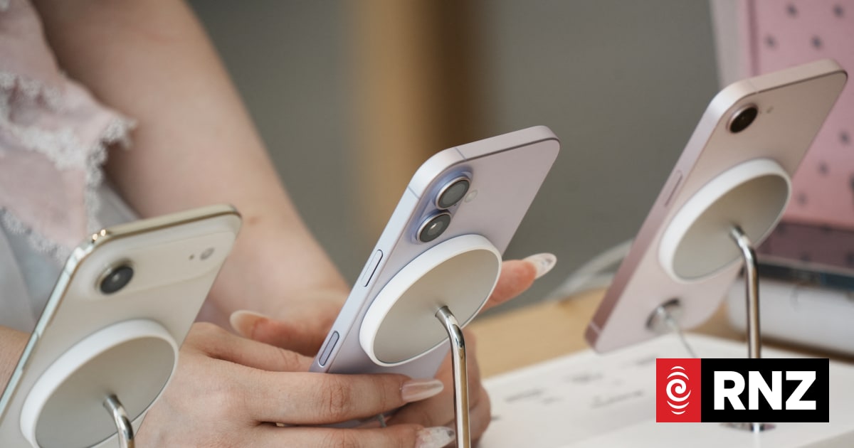 Customers purchase iPhone 17 series phones at the Apple flagship store in Hangzhou, Zhejiang Province, China on June 18