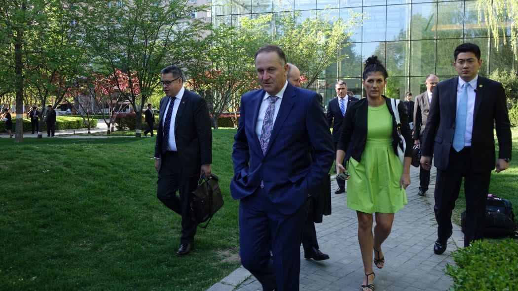 John Key arrives in Beijing with two senior ministers and 40 business delegates.