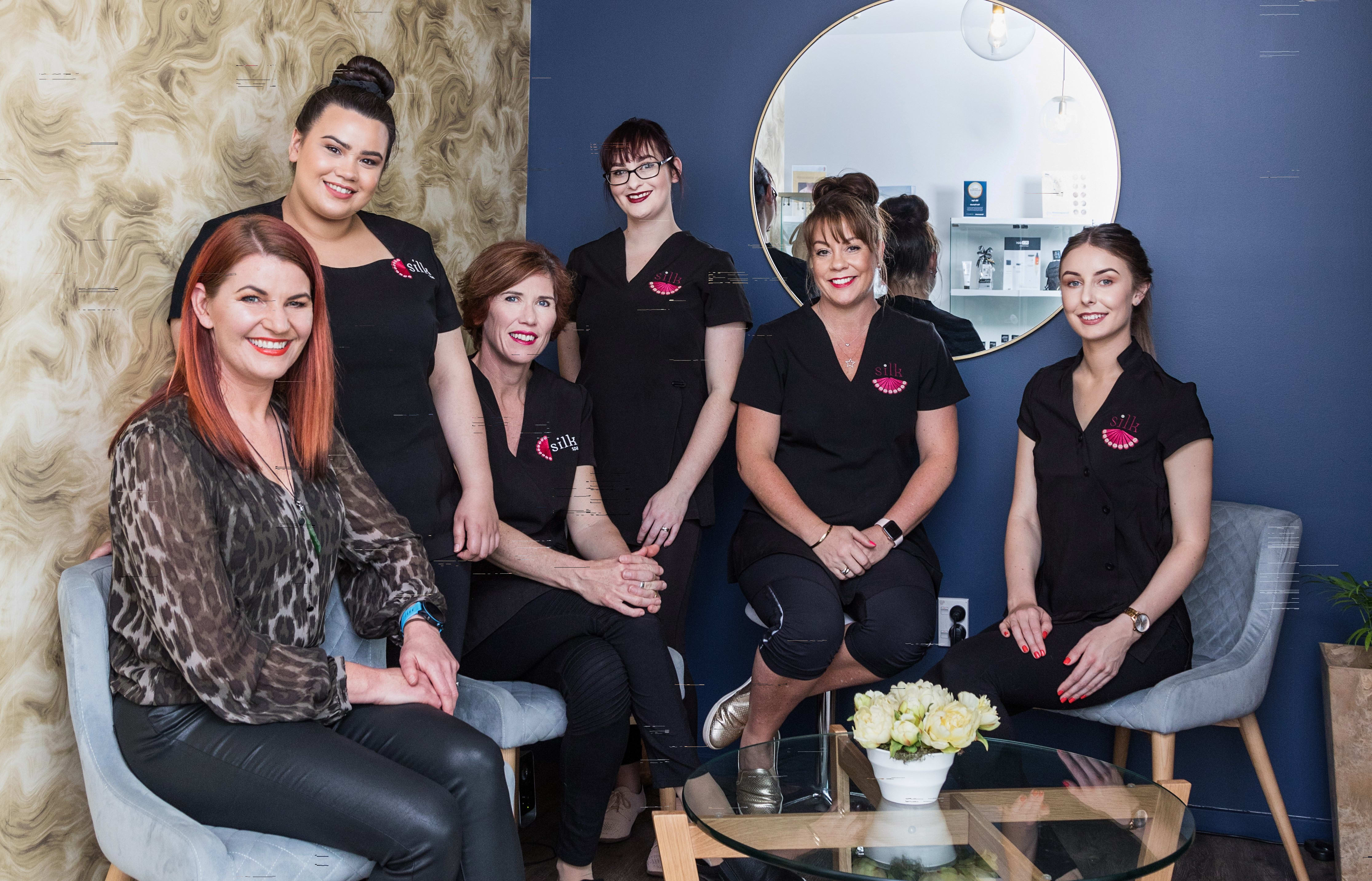 Charlotte Ward, fore, with her Silk Skin Spa beauty salon team.