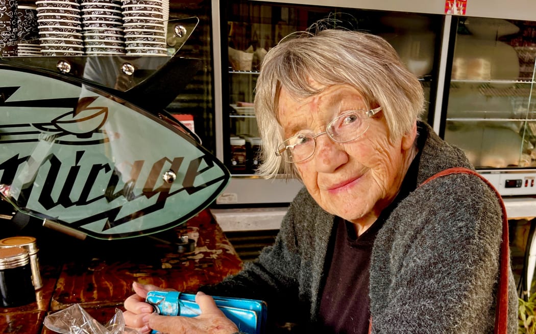 Bev Harris, buying biscuits made in Eltham to help people in Ukraine