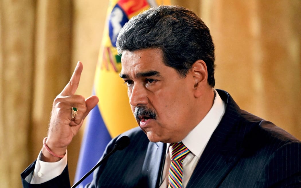 Venezuela's President Nicolas Maduro gestures as he speaks during a meeting at the National Assembly in Caracas on August 22.