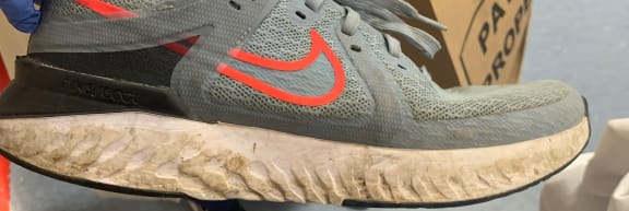 The man was wearing these shoes at the time of the crash.