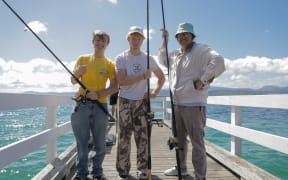 Fishing on the Wellington shore (from left) James Moreland, Theodore Hamm and Maynard Rono.