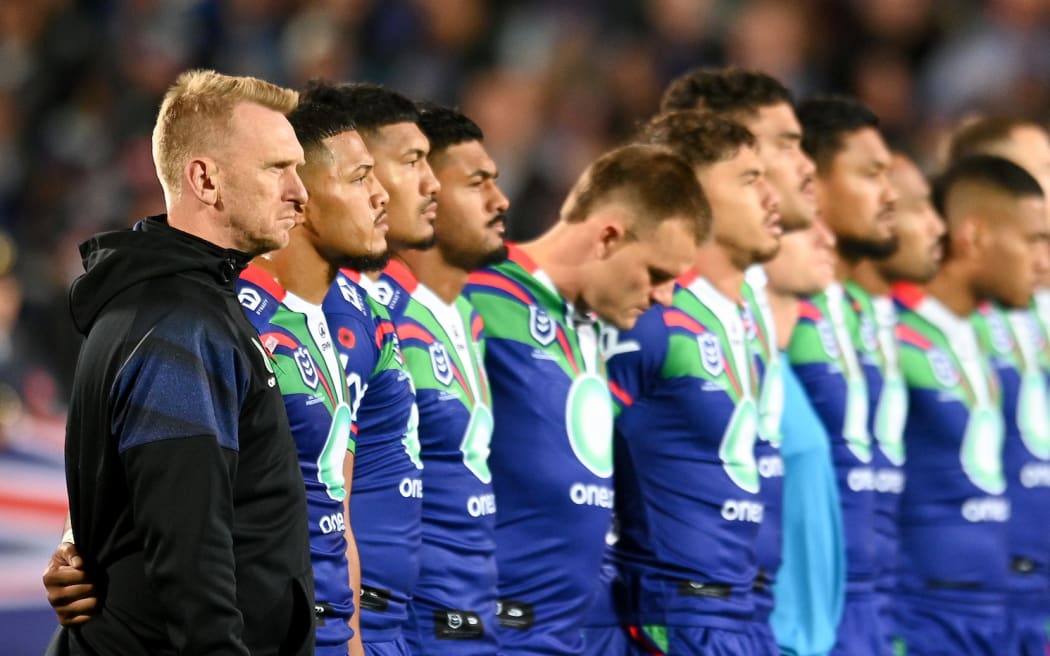 Andrew Webster Coach of the Warriors stands for the ANZAC day commemorations during the NRL Telstra Premiership, Warriors Vs Knights.