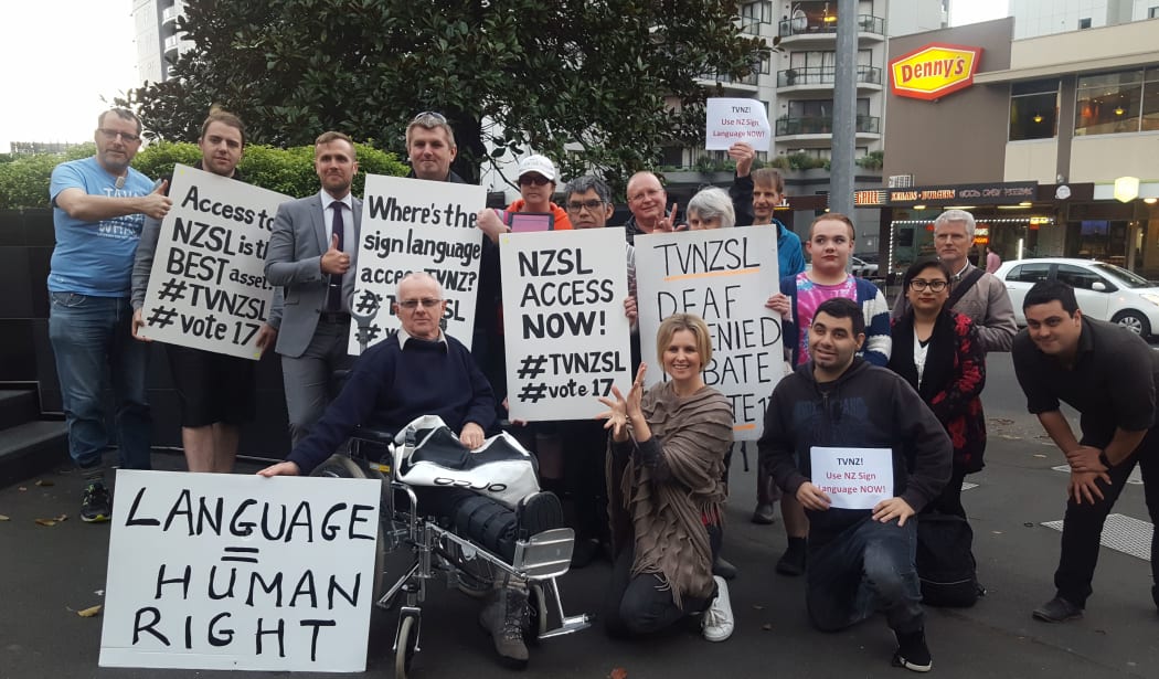 Protesters outside TVNZ's Auckland office.