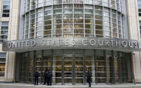 Police stand on duty for the start of jury selection for the El Chapo trial