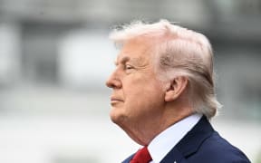 US President Donald Trump look on during an arrival ceremony on the South Lawn of the White House in Washington, DC, on April 28, 2026. (Photo by Jim WATSON / AFP)
