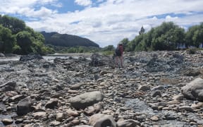 The Hutt River follows the Wellington Fault, which is surrounded by a damage zone of grey crushed rocks.