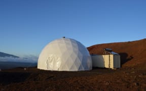 The team has almost no privacy, living in this small domed structure for a year.